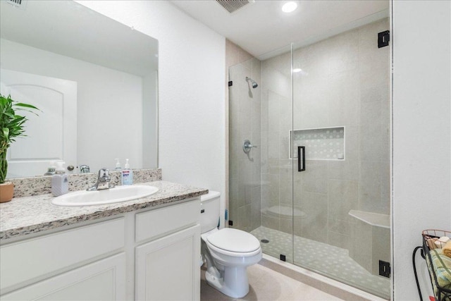 17216 Farmhouse Ln, Elgin, TX 78621 - full bathroom with vanity, toilet, and a shower stall