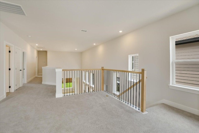 1404 S Brook Dr, Leander, TX 78641 - hall with carpet, an upstairs landing, baseboards, and recessed lighting