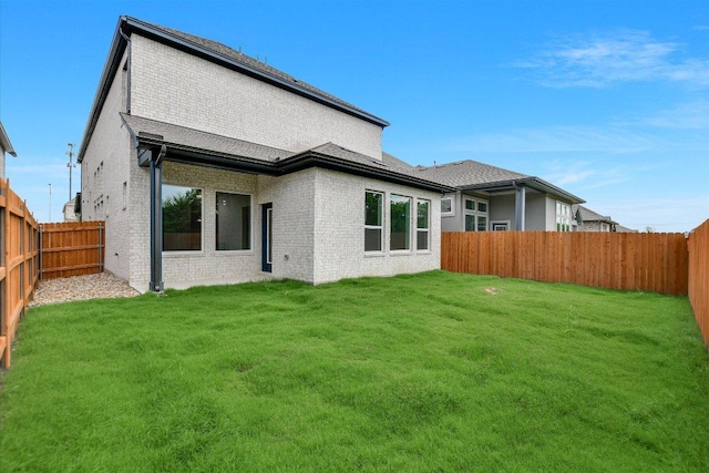 1404 S Brook Dr, Leander, TX 78641 - rear view of property featuring brick siding