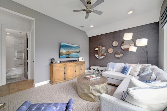 125 Reataway Dr, Dripping Springs, TX 78620 - living room with a ceiling fan, recessed lighting, baseboards, an accent wall, and wood finished floors