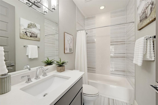 125 Reataway Dr, Dripping Springs, TX 78620 - bathroom with toilet, shower / tub combo, vanity, and recessed lighting