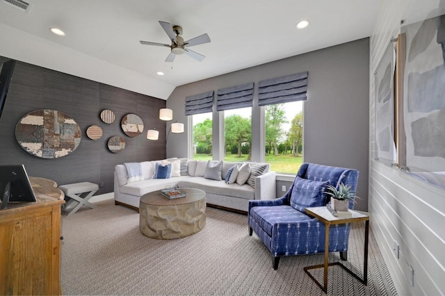125 Reataway Dr, Dripping Springs, TX 78620 - carpeted living room featuring recessed lighting, ceiling fan, an accent wall, and baseboards