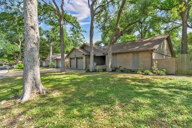 4807 Gerona Dr, Austin, TX 78759 - mid-century inspired home featuring a garage, brick siding, and driveway
