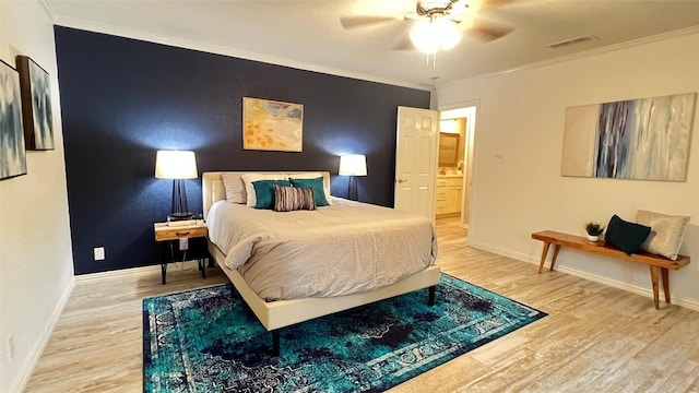 4807 Gerona Dr, Austin, TX 78759 - bedroom with wood finished floors, crown molding, and ceiling fan