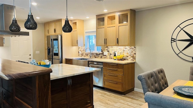 4807 Gerona Dr, Austin, TX 78759 - kitchen with appliances with stainless steel finishes, backsplash, recessed lighting, light wood-style flooring, and glass insert cabinets