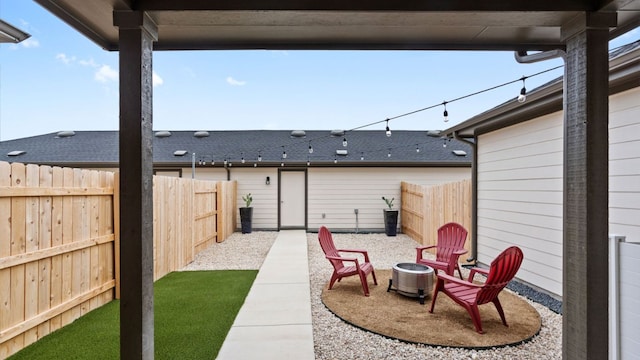 2540 Ophelia Levi Ln, Round Rock, TX 78665 - view of patio / terrace with a fenced backyard and an outdoor fire pit
