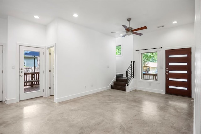 2011 Haskell St Unit A, Austin, TX 78702 - entryway with finished concrete floors, ceiling fan, stairs, baseboards, and recessed lighting