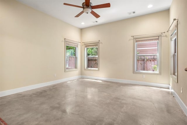 2011 Haskell St Unit A, Austin, TX 78702 - unfurnished room featuring finished concrete flooring, a ceiling fan, recessed lighting, and baseboards
