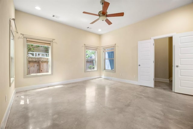 2011 Haskell St Unit A, Austin, TX 78702 - unfurnished room with concrete floors, a ceiling fan, baseboards, and recessed lighting