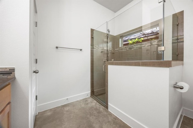 2011 Haskell St Unit A, Austin, TX 78702 - full bathroom with a stall shower, vanity, baseboards, and concrete floors