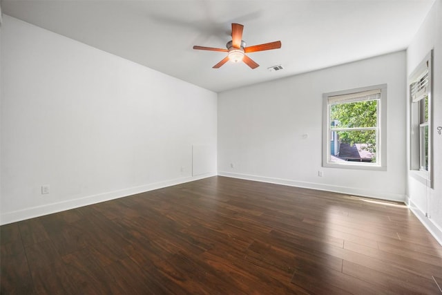 2011 Haskell St Unit A, Austin, TX 78702 - spare room with ceiling fan, dark wood-style flooring, and baseboards