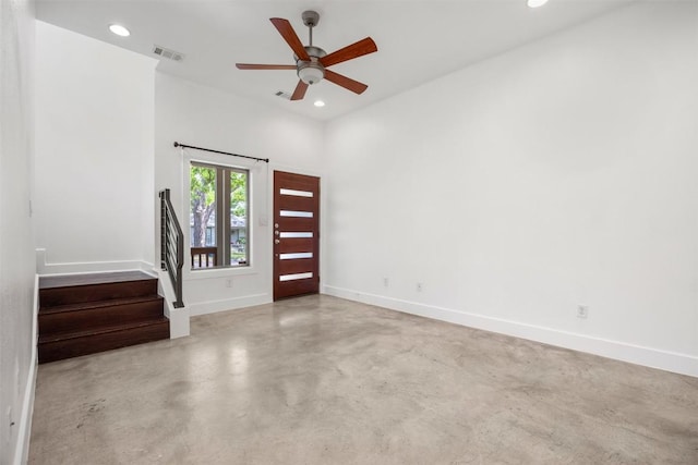 2011 Haskell St Unit A, Austin, TX 78702 - entryway with recessed lighting, stairway, baseboards, concrete floors, and ceiling fan