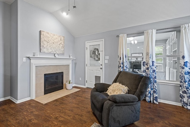 1416 Muddy Waters Dr, Pflugerville, TX 78660 - living area with a fireplace, wood finished floors, and lofted ceiling