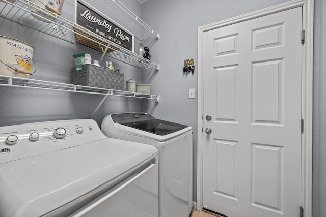 1416 Muddy Waters Dr, Pflugerville, TX 78660 - laundry room featuring washer and clothes dryer