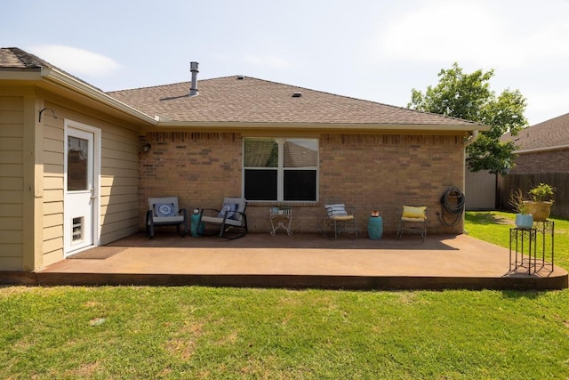 1416 Muddy Waters Dr, Pflugerville, TX 78660 - back of house with a patio area, brick siding, and roof with shingles