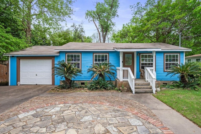4701 Milburn Ln, Austin, TX 78702 - ranch-style home featuring crawl space, asphalt driveway, and a garage