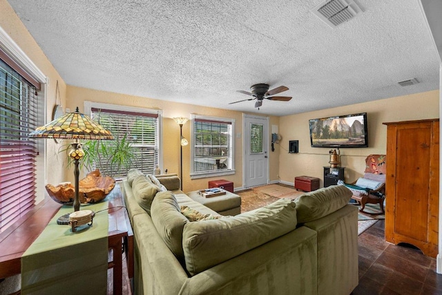4701 Milburn Ln, Austin, TX 78702 - living area with a ceiling fan and a textured ceiling