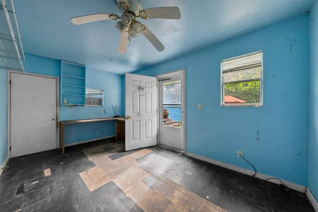 4701 Milburn Ln, Austin, TX 78702 - entryway featuring ceiling fan and baseboards