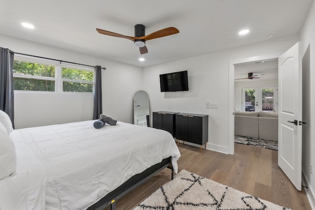 5800 Marilyn Dr, Austin, TX 78757 - bedroom featuring multiple windows, light wood-type flooring, recessed lighting, ceiling fan, and baseboards