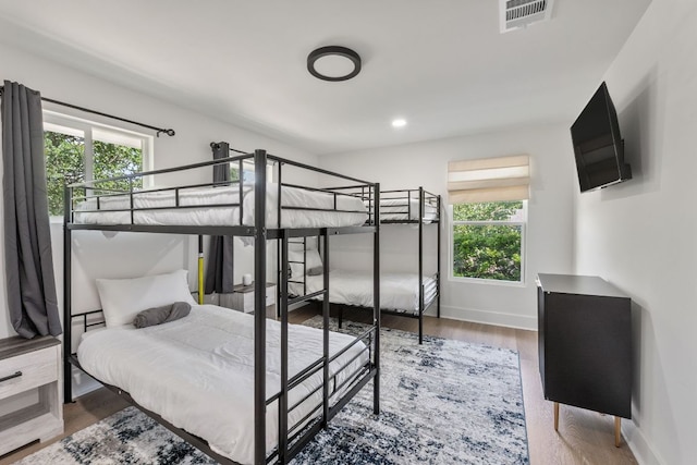 5800 Marilyn Dr, Austin, TX 78757 - bedroom with wood finished floors and baseboards
