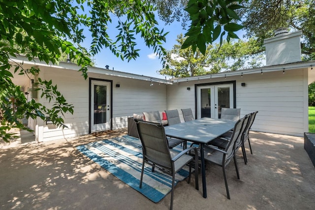 5800 Marilyn Dr, Austin, TX 78757 - view of patio / terrace featuring french doors and outdoor dining area