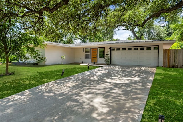 5800 Marilyn Dr, Austin, TX 78757 - ranch-style home featuring a garage and driveway
