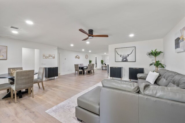 5800 Marilyn Dr, Austin, TX 78757 - living area with light wood finished floors, recessed lighting, and ceiling fan