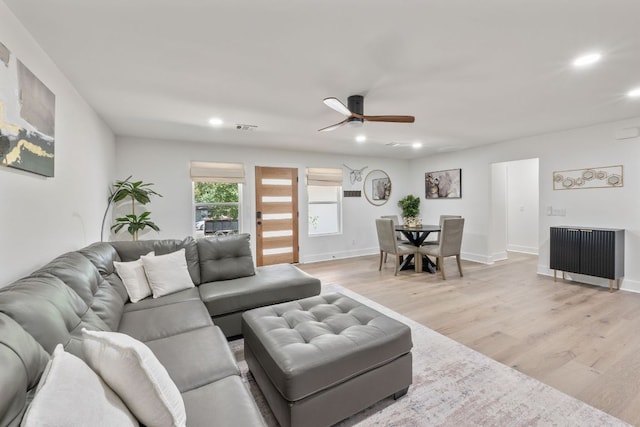 5800 Marilyn Dr, Austin, TX 78757 - living area with recessed lighting, ceiling fan, radiator heating unit, and light wood-type flooring