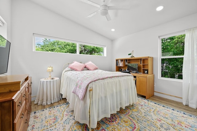 bedroom featuring baseboards, lofted ceiling, light wood-style floors, and recessed lighting