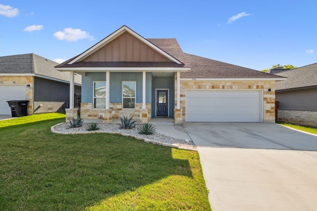 206 N Winston Dr, Fredericksburg, TX 78624 - view of front of property with concrete driveway, a front lawn, stone siding, an attached garage, and a porch