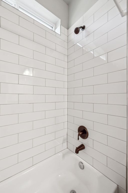 206 N Winston Dr, Fredericksburg, TX 78624 - full bathroom with washtub / shower combination