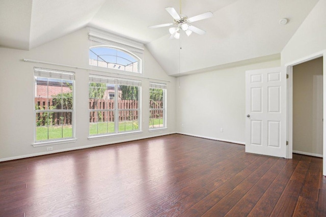 10120 Treasure Island Dr, Austin, TX 78730 - unfurnished living room featuring vaulted ceiling, ceiling fan, dark wood finished floors, and baseboards