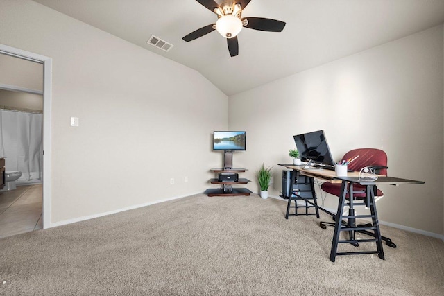 office with carpet, a ceiling fan, lofted ceiling, and baseboards