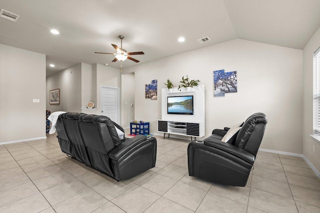 living room with light tile patterned floors, ceiling fan, recessed lighting, vaulted ceiling, and baseboards