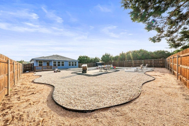 21604 Bluejay Blvd, Lago Vista, TX 78645 - fenced backyard featuring a patio