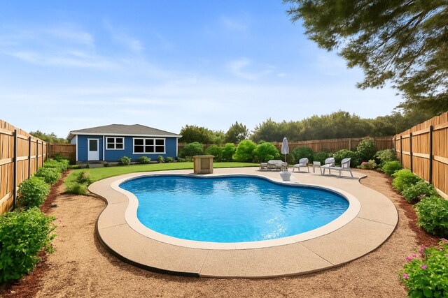21604 Bluejay Blvd, Lago Vista, TX 78645 - view of swimming pool featuring a patio and an outbuilding