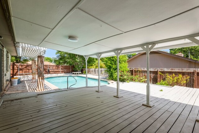 11525 Spring Hill Dr, Austin, TX 78753 - view of swimming pool with a deck and a fenced backyard
