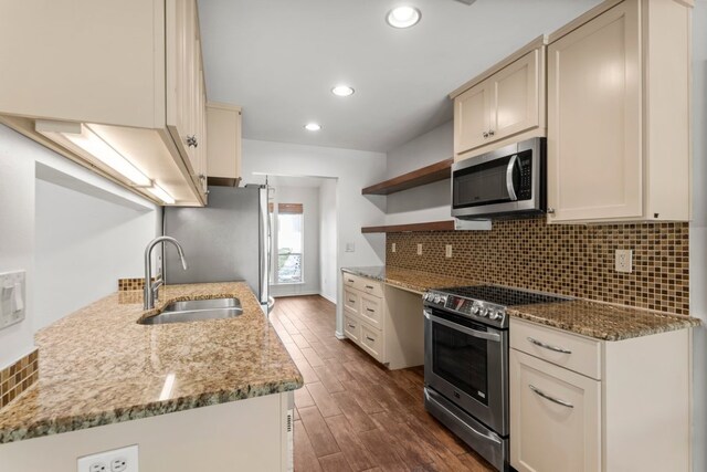 11525 Spring Hill Dr, Austin, TX 78753 - kitchen with stainless steel appliances, a sink, open shelves, dark wood-style flooring, and recessed lighting