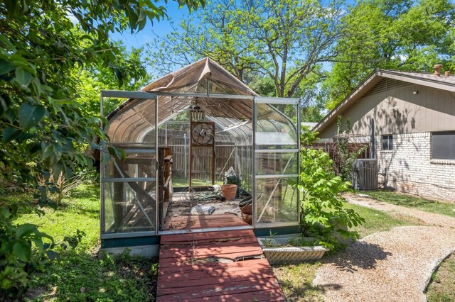 11525 Spring Hill Dr, Austin, TX 78753 - view of greenhouse featuring central AC unit