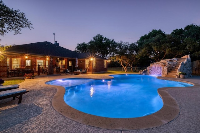 view of pool featuring a fenced in pool, a patio, and fence