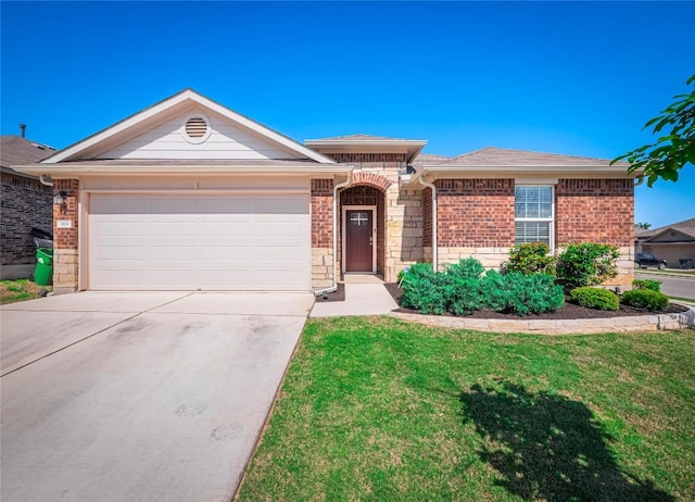369 Empress Tree Dr, Leander, TX 78641 - view of front of house with concrete driveway, an attached garage, brick siding, a front lawn, and stone siding