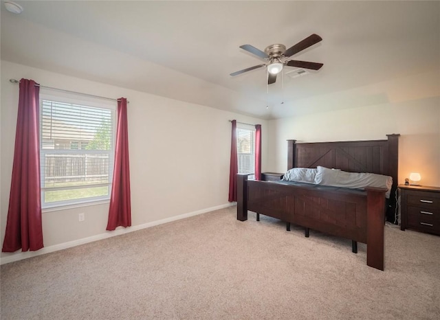 369 Empress Tree Dr, Leander, TX 78641 - bedroom with light colored carpet, baseboards, and a ceiling fan