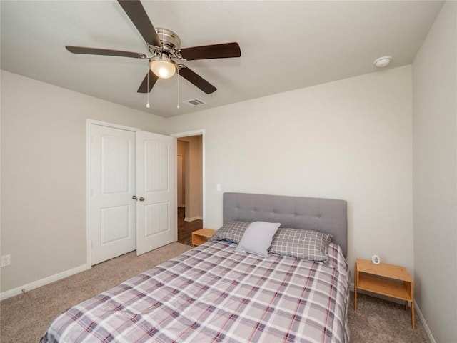 369 Empress Tree Dr, Leander, TX 78641 - bedroom with carpet floors, baseboards, and ceiling fan