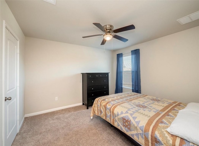 369 Empress Tree Dr, Leander, TX 78641 - bedroom with light carpet, baseboards, and ceiling fan