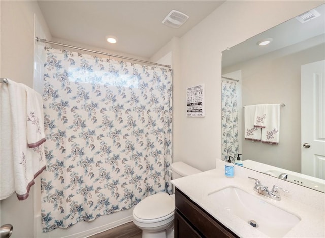 369 Empress Tree Dr, Leander, TX 78641 - bathroom featuring vanity, toilet, recessed lighting, and shower / bathtub combination with curtain