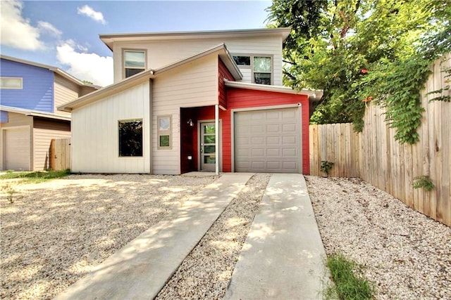 1302 E 3rd St, Austin, TX 78702 - view of front facade with concrete driveway and a garage