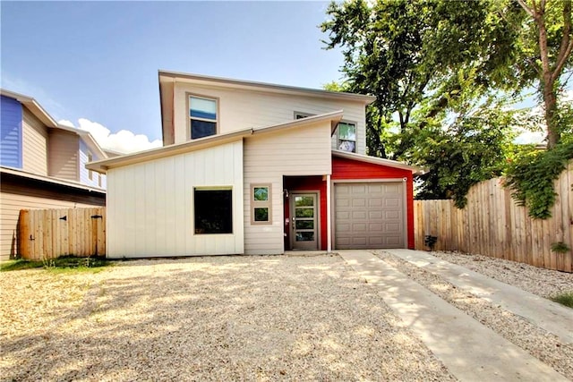 1302 E 3rd St, Austin, TX 78702 - view of front of home with an attached garage and driveway