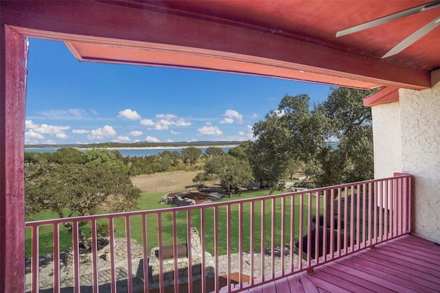 balcony featuring a water view