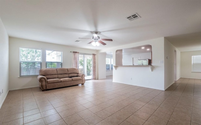 504 Dark Tree Ln, Round Rock, TX 78664 - living room with light tile patterned floors and a ceiling fan