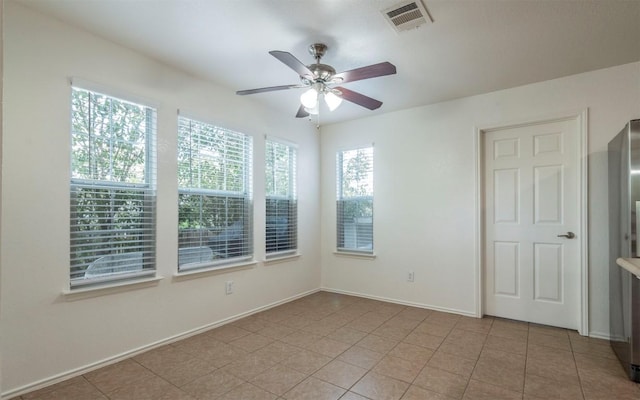 504 Dark Tree Ln, Round Rock, TX 78664 - spare room featuring a ceiling fan and light tile patterned floors